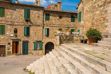 The steps of the Parish Church in the historic centre of the medieval town of Monticiano in Siena...