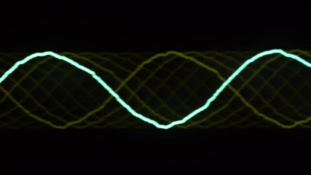 Audio signal on oscilloscope screen. Communication and electronics. Close up