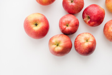 red apples on white background, many apples