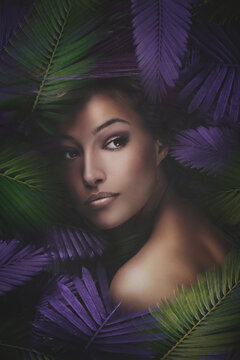 beauty woman  portrait with exotic leaves