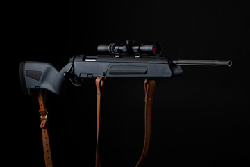Scout rifle on black background, bolt rifle on black background, scope with enlarged airelif, soft...