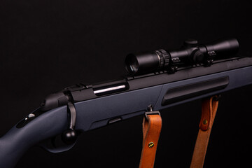 
Scout rifle on black background, bolt rifle on black background, scope with enlarged airelif...