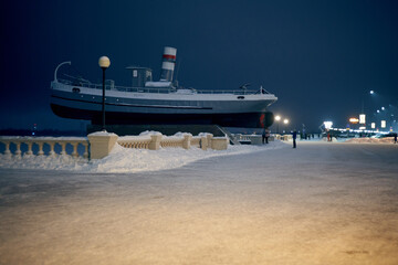 Nizhny Novgorod, Russia. January 5, 2021: Boat Hero is installed on the post at the foot of the...