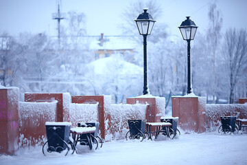 Naklejka premium landscape bench in city park winter frost, christmas morning in the city
