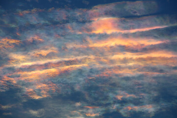 Iridescent Cloud or colorful dramatic sky with cloud at sunset of Thailand