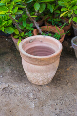 Empty unpainted clay pot isolated