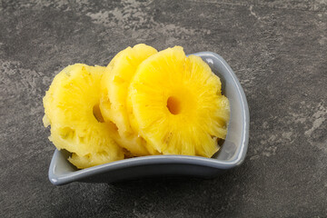 Sweet pineapple rings in the bowl