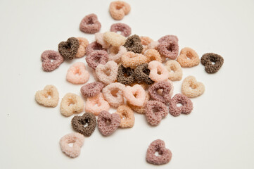 Heart shape breakfast cereals.   Hand made Natural soy wax decoration. Valentine's Day theme. True love symbolism. Creative idea. Warm greetings.