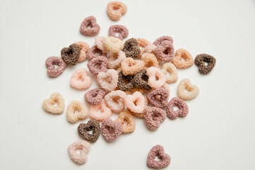 Heart shape breakfast cereals.   Hand made Natural soy wax decoration. Valentine's Day theme. True love symbolism. Creative idea. Warm greetings.