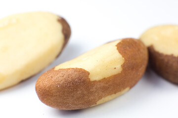 Brazil nuts on white background. Close up photo.