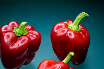 bell pepper on a dark background on a glass matte table wallpaper size 16: 9 stock photo