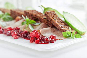 Beautifully decorated catering banquet table with different food snacks and appetizers