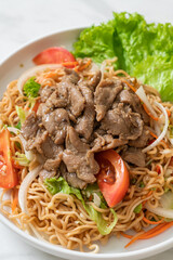 instant noodle spicy salad with pork
