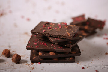 handmade chocolate with nuts on a light background