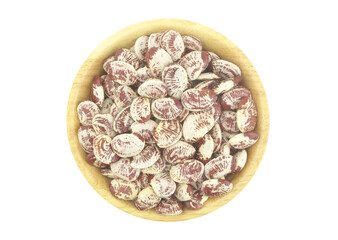 Christmas lima beans in wooden bowl isolated on white background
