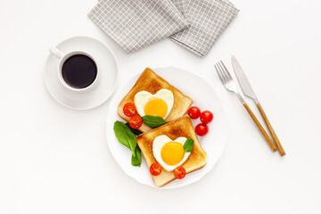 Idea for the celebration of Valentine's day: breakfast - toast with scrambled eggs in the form of hearts