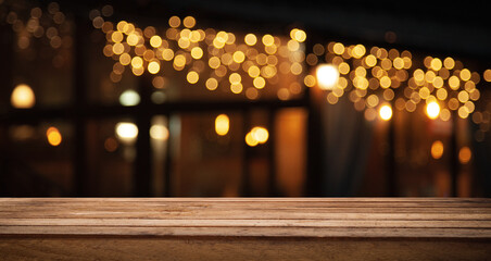 dark blurred cafe background with empty table top for your display