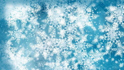 Blue winter background with flying snowflakes