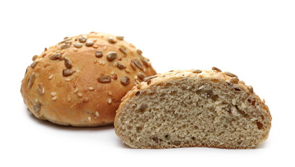Round bread loafs, buns with mixed seeds and sliced half isolated on white background