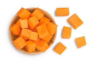 butternut squash slice in wooden bowl isolated on white background with clipping path and full depth of field. Top view. Flat lay