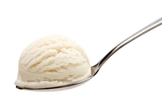 Vanilla ice cream scoop in spoon isolated on white background including clipping path.
