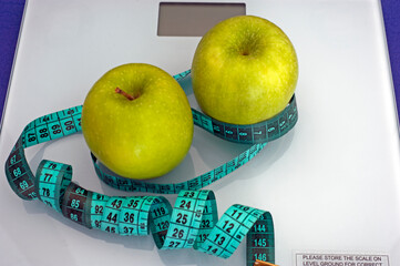 green apple on the scale