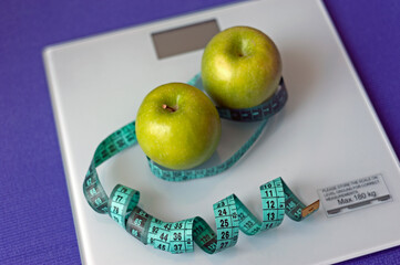 green apple on the scale