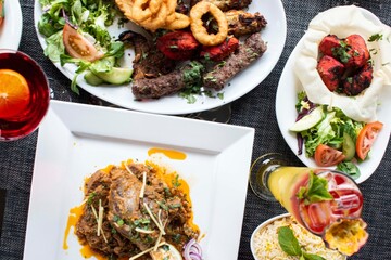 Indian food  platter   kebabs  salad   curry  on a platter 