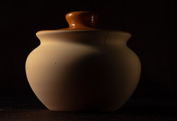 brown clay pot, pot. Type of clay pot.