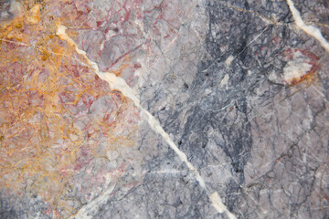 Multi-colored stone surface. Mineral surface. Natural background.