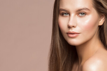 Fototapeta premium Beautiful Model Woman clean Face. Perfect fresh Skin. Girl Facial and Hair Treatment Cosmetology