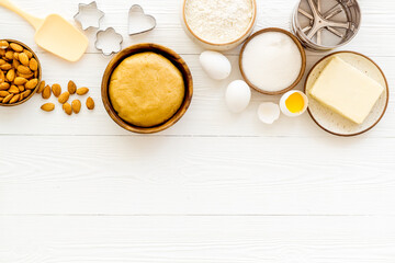 Pastry baking ingredients and utensils on kitchen table