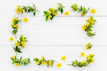 Spring card mockup with yellow flowers with leaves, top view