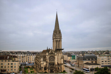 Fototapeta na wymiar French town, Caen city skyline in a cloudy day