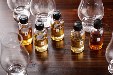 tasting bottles and glasses of whisky spirit brandy cognac. tasting at home