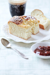 Simple yeast cake on bright background.