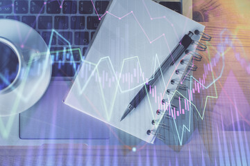 Multi exposure of forex chart drawing and work table top veiw. Concept of financial analysis.