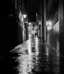 Reflections in a lonely street in Santiago de Compostela on a rainy night