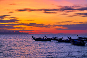 Sunrise Skyline with Silhouette Boat on Koh Lipe Islands in thailand