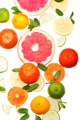 Citrus background. Fresh citrus fruits - Lemons, oranges, limes, grapefruits on the white background