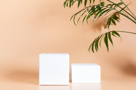 White empty podium stands on light color background.