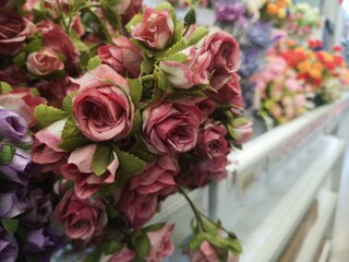 Red, dark pink, violet Rose handmade Beautiful Artificial bouquet flowers decoration ornamental background in vintage classic tone color for greeting card or celebration Valentine Day, love symbol