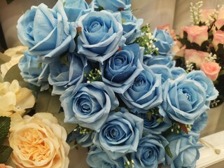 soft blue Rose handmade Beautiful Artificial bouquet flowers decoration ornamental background in vintage color for greeting card celebration from fabric and plastic, Valentine love