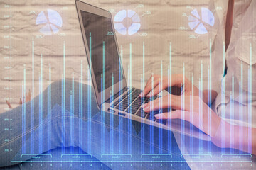 Multi exposure of woman hands typing on computer and forex chart hologram drawing. Stock market analysis concept.