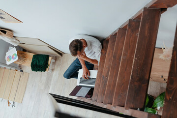 young designer works in a home Studio.