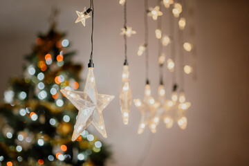 Christmas Decoration Background. Xmas Star Illumination. Christmas Tree Lights.