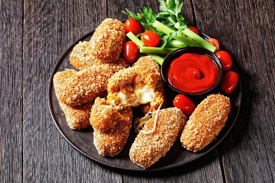 Suppli Al Telefono On A Black Plate, Top View