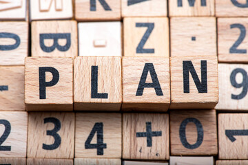 Word plan arranged from wooden letters. Concept for business.