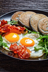 buckwheat pancake with fried Eggs and bacon