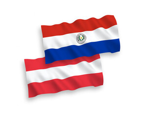 National vector fabric wave flags of Austria and Paraguay isolated on white background. 1 to 2 proportion.